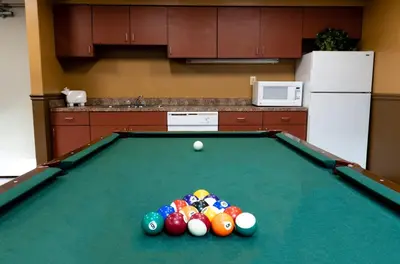 a pool table with a pile of balls on it at PP 1801 Modern Corporate 2br, pool, Gym in Harrisburg