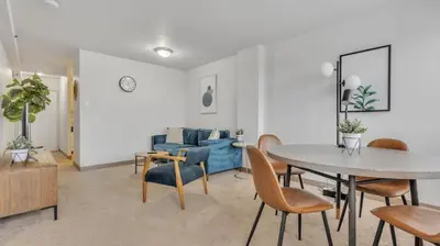 a living room with a table and chairs at PP 2114 Professional 2br apt, Near Hospitals in Harrisburg