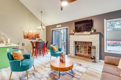 a living room with a couch and a fireplace at Cozy Cabin with Deck Less Than 1 Mi to Jack Frost Resort! in White Haven