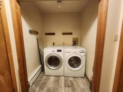 a washer and dryer in a small room at Poconos Retreat in Bushkill