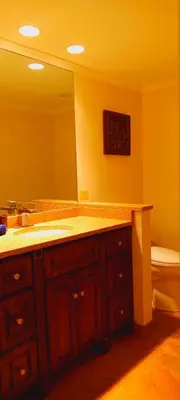 a bathroom with a sink and a mirror and a toilet at Escape to the Catskills in Liberty