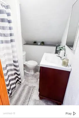 a bathroom with a sink and a toilet at Cozy Palace in Livingston Manor
