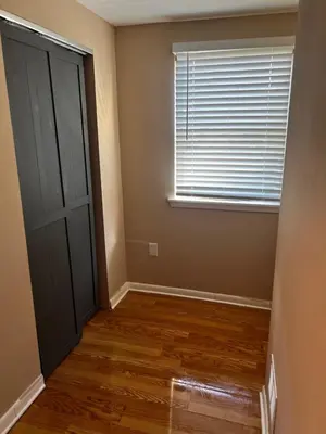 an empty room with a door and a window at Spacious 3 BR Ewing Home -Quiet in Trenton
