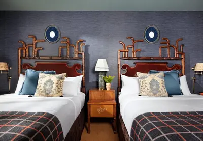 two beds in a hotel room with two beds sidx sidx sidx at Graduate by Hilton Princeton in Princeton