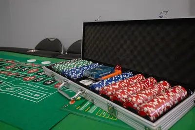 a poker table with a case of coke bottles on it at Pocono Retreat Movies Games Spacious in Long Pond