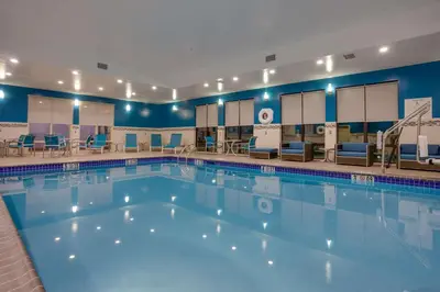 a large swimming pool in a hotel room at Hampton Inn & Suites Philadelphia/Bensalem in Bensalem