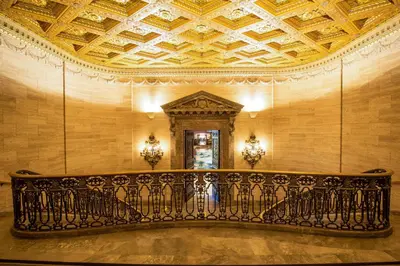 an ornate railing in a room with a ceiling at Hotel Du Pont in Wilmington