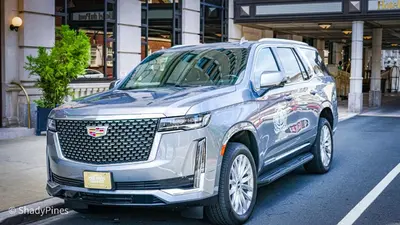 a silver suv parked on a city street at Hotel Du Pont in Wilmington