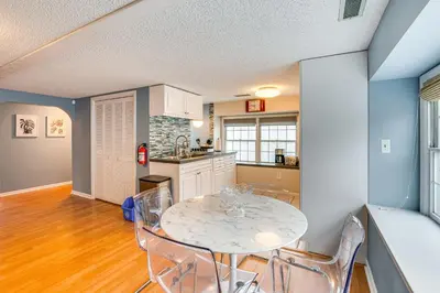 a kitchen and dining room with a table and chairs at 7 Mi to Newark Montclair Vacation Rental in Montclair