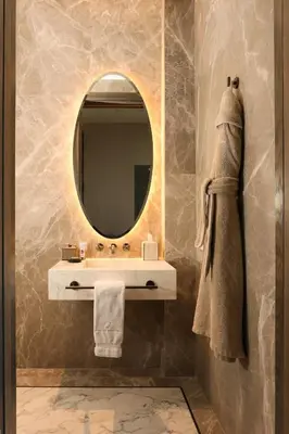 a bathroom with a sink and a mirror at Maison Hudson in New York