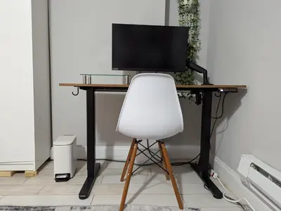 a desk with a white chair and a television on it at Private Room at a 3 bedroom Apt at the heart of East Village - shared apartment in New York