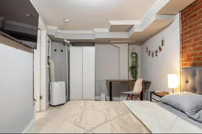 a bedroom with a bed and a desk at Private Room at a 3 bedroom Apt at the heart of East Village - shared apartment in New York