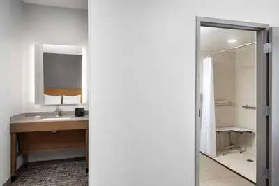 a bathroom with a sink and a mirror at Hyatt Place Mt. Laurel in Mount Laurel