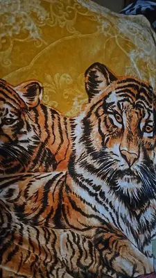 a painting of a tiger laying on a pillow at Room G DIVINE VILLA AND RESORT, 6 MINS TO AIRPORT, 4MINS TO PENN STATION. in Newark
