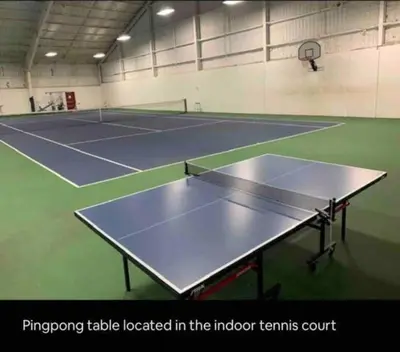 a pingpong table located in the indoor tennis court at Stylish Townhouse Steps to Ski Mtn & Waterpark in Tannersville
