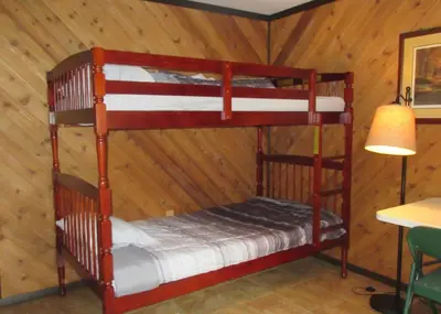 a room with two bunk beds in a cabin at Scenic View Lodging in Millerstown