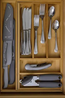 a wooden drawer with utensils in it at Comfortable living in Philadelphia