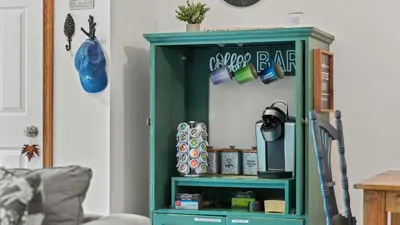 a green cabinet with a mirror in a room at Maple Oasis by AvantStay Newly Built w Hot Tub Game Room Fire Pit in Blakeslee