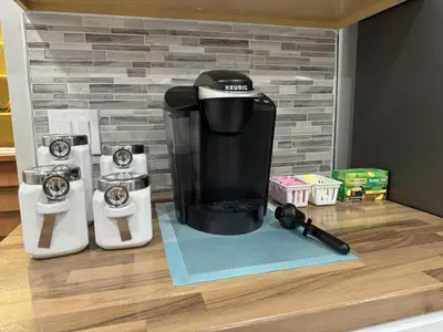 a coffee maker sitting on top of a counter at Modern Queen Room Near EWR in Elizabeth