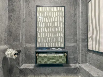 a bathroom with a shelf with towels and a window at Sage Stay by the Train, We Pay Half Your Parking, 2 Queen Beds plus Sleeps 6 in Hoboken