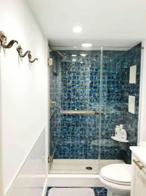 a bathroom with a shower and a toilet at Center City Townhome in Quiet Courtyard in Philadelphia