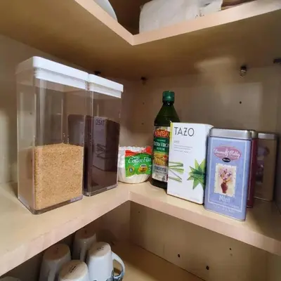 a kitchen shelf with food items on it at Fun Fishtown Rowhome - Sleeps 4 in Philadelphia