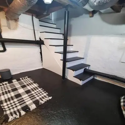 an overhead view of a set of stairs in a room at Fun Fishtown Rowhome - Sleeps 4 in Philadelphia