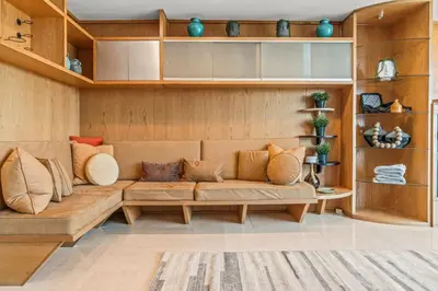 a living room with a couch and shelves at 5 bdrm - Heated Indoor Pool - Elevator in Philadelphia