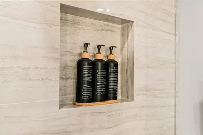 a shelf with three black oxygen bottles in a wall at 5 bdrm - Heated Indoor Pool - Elevator in Philadelphia