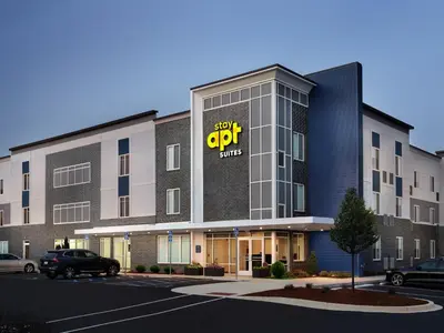 a building with a sign for a stop crock clinic at stayAPT Suites Harrisburg-Hershey in Harrisburg
