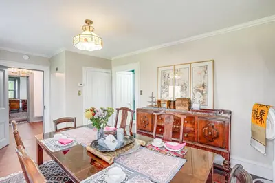a dining room with a glass table and a dining room at Tranquil and Historic Estate Near Valley Forge in Eagleville