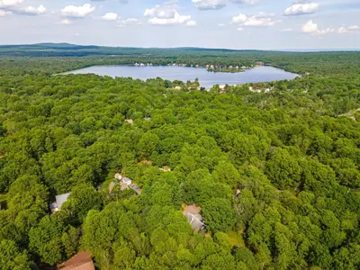 an aerial view of a forest and a lake at Updated 3 BDR Gas Fire Place BBQ in Albrightsville