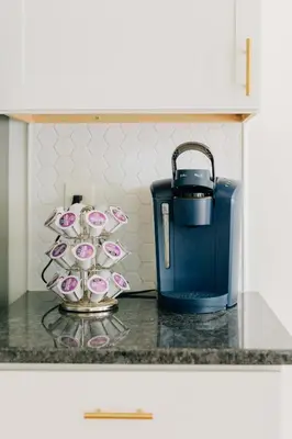 a counter with a tea kettle and cups on it at Getaway on Grant heart of Downtown with parking in Lancaster