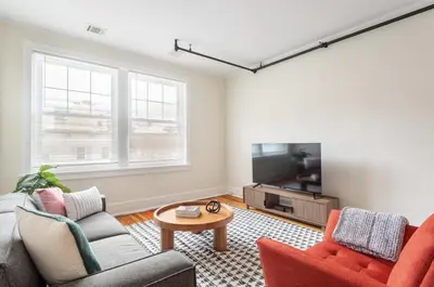 a living room with two couches and a tv at Fun & Funky 2BR in Downtown Princeton in Princeton