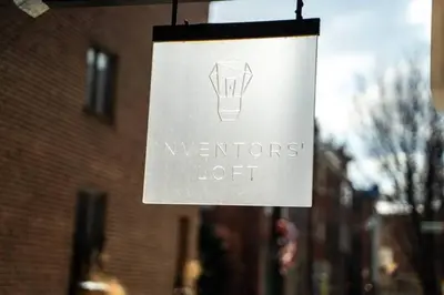a sign that reads writers off hanging in front of a building at Inventors' Loft - Stay in the Heart of it All in Philadelphia