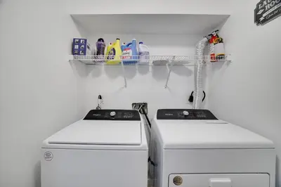 a kitchen with a stove and a refrigerator at 30 Day Minimum Stay - Private Creekside Solace in East Stroudsburg