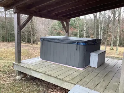 a gazebo with a large trash can on a deck at Mighty Oak near Sayre Towanda in Ulster