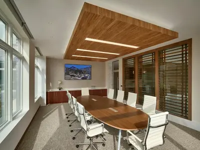 a conference room with a wooden table and chairs at AVE Florham Park - Furnished Apartment, Florham Park NJ in Florham Park