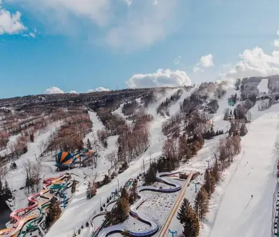 an aerial view of a ski resort in the snow at Casa di Montagna/5BR/3Bath/NearResorts/PetsAllowed in Pocono Lake