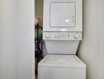 a white washer and dryer in a room at 2BR Cottage with Hot Tub in Tobyhanna