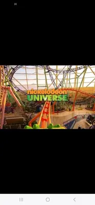 a ride at a theme park with a roller coaster at The Luxurious loft in Newark