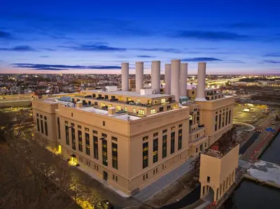 an aerial view of a large building with smoke stacks at Riversuites At The Battery in Philadelphia