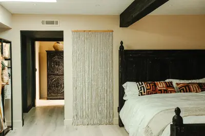 a bedroom with a bed and a black headboard at Stunning Villa in Princeton, NJ in Princeton