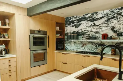 a kitchen with a sink and a stove top oven at Stunning Villa in Princeton, NJ in Princeton