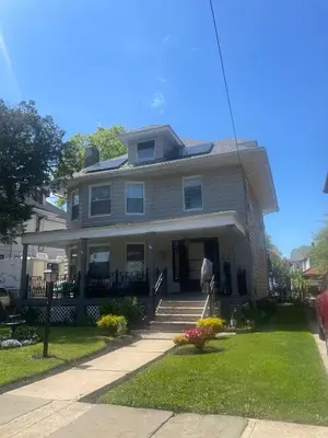a large house with a porch and stairs to the door at Elizabeth New Jersey bedroom -Newark Airport -New York City in Elizabeth
