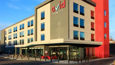a building with an amazon office on the front at avid hotel Harrisburg NE - Hershey Area by IHG in Harrisburg