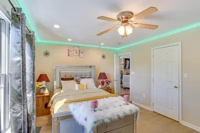 a bedroom with a bed and a ceiling fan at Harrisburg Retreat with 8 Mi to Hersheypark in Harrisburg