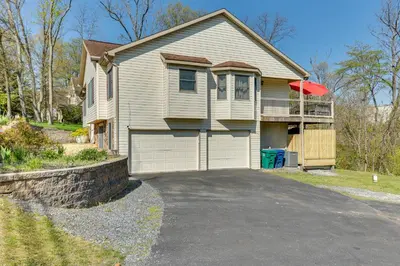 a house with a garage and a driveway at Harrisburg Retreat with 8 Mi to Hersheypark in Harrisburg