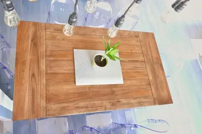 a wooden table with a plant on top of it at 10 guest Ski Chalet Pools Golf Ski Hike in Vernon Township