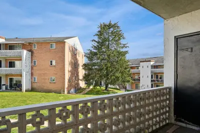 a view from the balcony of an apartment building at Historic Charm Meets Modern Comfort The Chateau in Wilmington